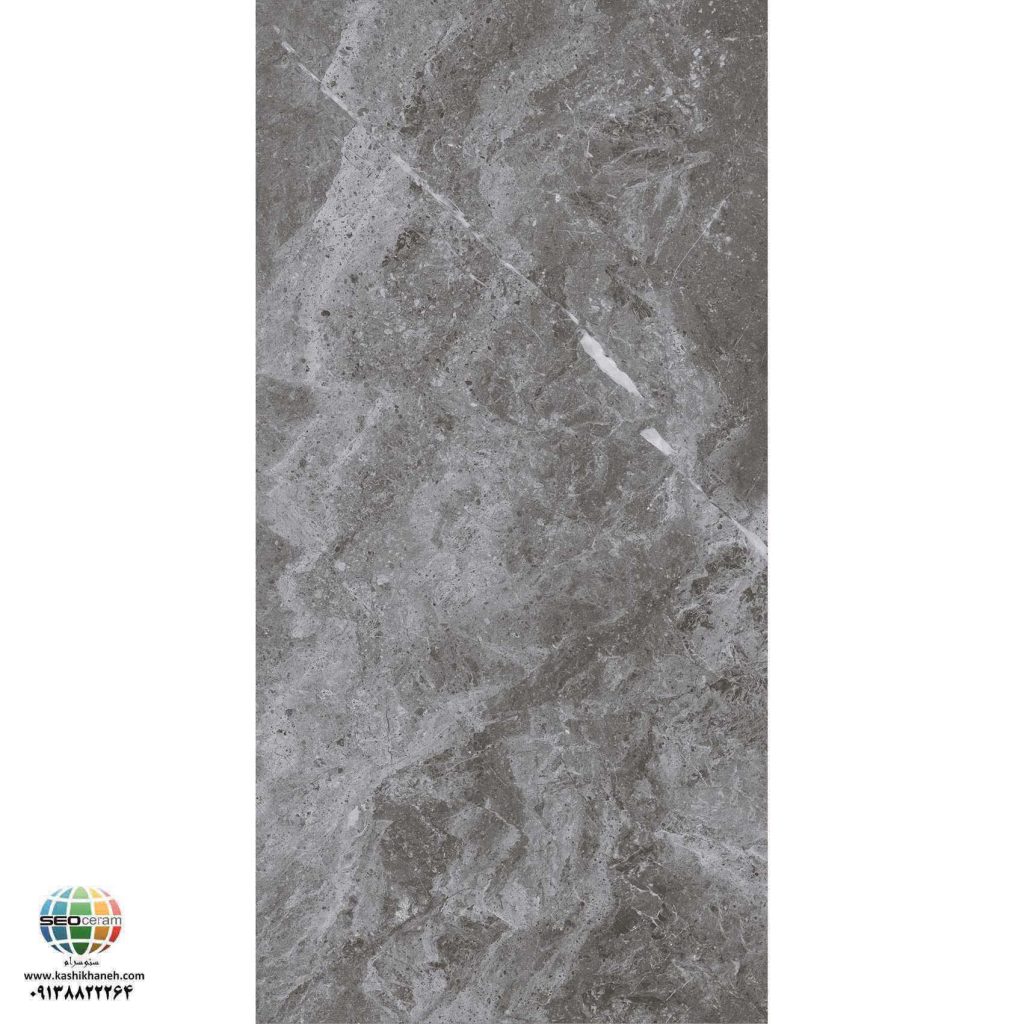 سرامیک پرسلان مات ادوارد طوسی تیره کاشی الوند تولید شده در سایز 120×60 با لعاب مات ابریشمی و ضخامت 12 میلیمتر یکی از طرح های زیبای کاشی های تولیدی شرکت کاشی الوند می باشد. این محصول از جنس پرسلان با بالاترین دوام در شرایط سخت و کمترین میزان جذب آب ممکن می باشد.