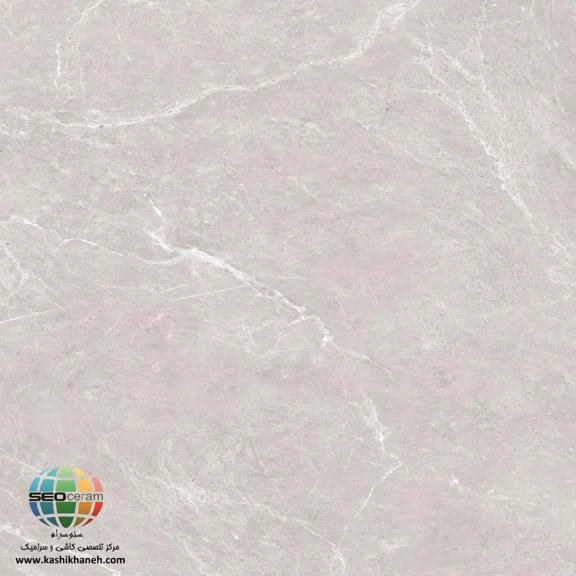 سرامیک باراسون طوسی کاشی پرسپولیس اگر به دنبال کف‌پوشی هستید که شکوه، سادگی و استحکام را همزمان به فضای شما هدیه دهد، سرامیک باراسون طوسی کاشی پرسپولیس بهترین انتخاب است. در طراحی‌های مدرن و صنعتی (Industrial Style)، رنگ طوسی به عنوان پادشاه رنگ‌ها شناخته می‌شود. سرامیک باراسون طوسی کاشی پرسپولیس با ابعاد بزرگ و شیک 100*100، فضایی مینیمال و بسیار لوکس را برای شما به ارمغان می‌آورد. باراسون طوسی کاشی پرسپولیس که از تولیدات برتر کارخانه پرسپولیس است، با لعاب مات خود، توازنی بی‌نظیر میان سادگی و اصالت ایجاد کرده و به دلیل ابعاد بزرگ، مرزهای بین تایل‌ها را به حداقل می‌رساند. خرید سرامیک باراسون طوسی کاشی پرسپولیس سایز 100×100. پرسلان مات ۱۰ میل با دوام بالا و کیفیت و قیمت عالی، ایده‌آل برای انواع کف‌پوش سالن، پذیرایی و لابی، همچنین سالن های تجاری و مراکز خرید می باشد.  برای خرید این محصول با قیمت بسیار عالی با واحد فروش بازرگانی کاشی و سرامیک سئوسرام (نمایندگی کاشی پرسپولیس در اصفهان) 09138822264 تماس حاصل نمایید.