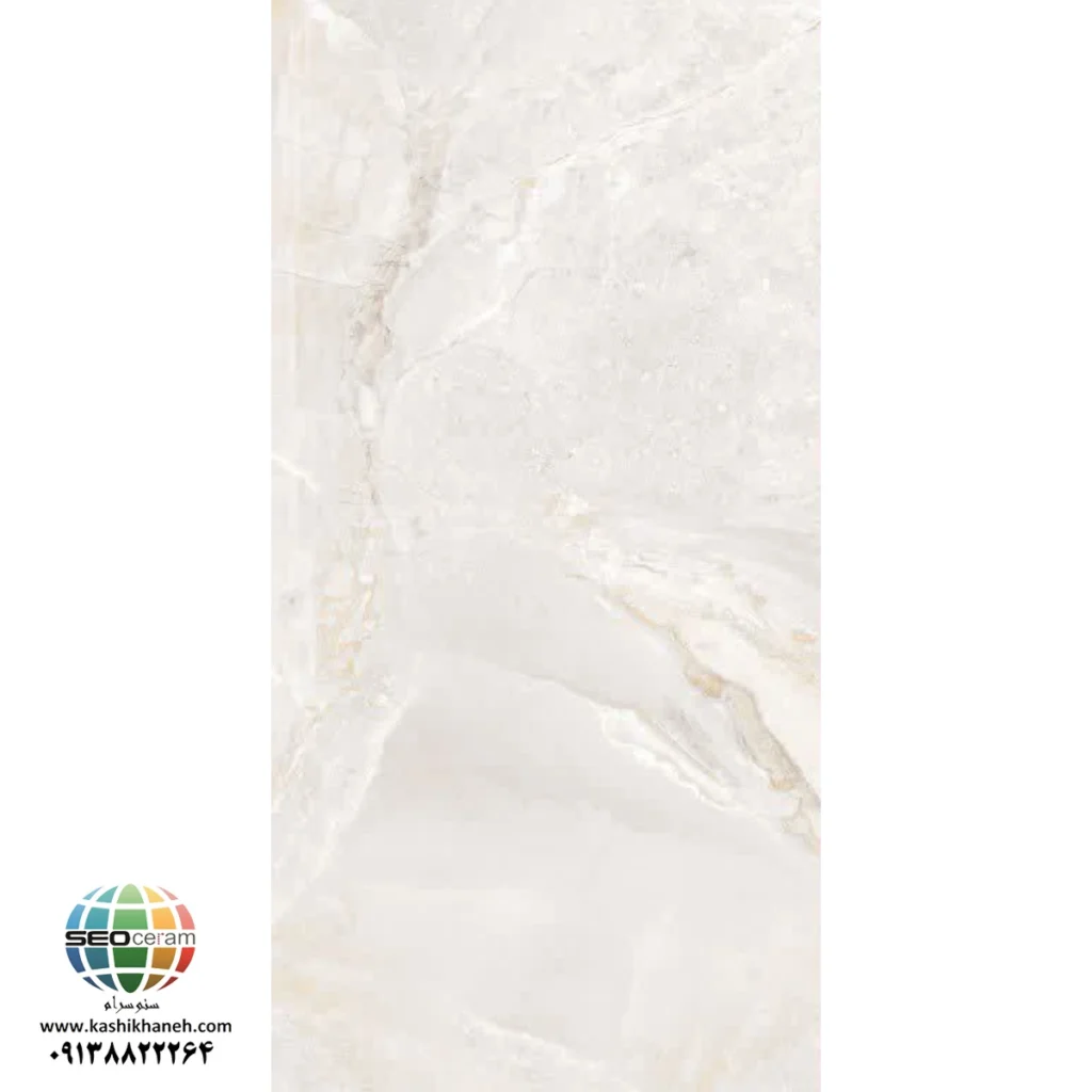 سرامیک S601206031 کاشی برج اردکان - 120×60 سرامیک S601206031 کاشی برج اردکان سایز 60×120 یکی از محصولات باکیفیت و پرکاربرد کارخانه کاشی برج است که با جنس خاک سفید مقاوم و لعاب ترانس (براق)، گزینه‌ای ایده‌آل برای فضاهای داخلی مدرن محسوب می‌شود. سرامیک S601206031 کاشی برج  با ابعاد بزرگ خود، جلوه‌ای یکدست و منظم به دیوارها می‌بخشد و با کاهش بندکشی، نمایی لوکس و حرفه‌ای ایجاد می‌کند. سرامیک S601206031 کاشی برج اردکان با طرح سنگ  و رنگ ترکیبی کرم  و طوسی روشن، انتخابی ایده‌آل برای فضاهایی است که نیاز به آرامش بصری، روشنایی و طراحی مدرن دارند. این محصول با لعاب ترانس یا براق تخت، سطحی یکدست و طبیعی ایجاد می‌کند که علاوه بر زیبایی، باعث کاهش بازتاب نور و ایجاد فضایی دلنشین می‌شود. طراحی سنگ‌مانند و رنگ خنثی سرامیک S601206031 کاشی برج اردکان، امکان استفاده گسترده در دیوار حمام، سرویس بهداشتی، راه‌پله، پارکینگ و حتی فضاهای تجاری و انواع مغازه و رستوران را فراهم کرده است. کیفیت ساخت بالا و یکنواختی سطح آن، سرامیک S601206031 کاشی برج را به گزینه‌ای مطمئن برای پروژه‌های ساختمانی و طراحی‌های امروزی تبدیل می‌کند. انعکاس مناسب نور روی سطح براق سرامیک S601206031 کاشی برج به روشن‌ تر شدن محیط کمک کرده و فضاهایی مانند پارکینگ، راه‌پله،حمام و سرویس بهداشتی را بزرگ‌تر و تمیزتر نشان می‌دهد.همچنین مناسب برای اجرا در بدنه انواع فضاهای تجاری و حتی هتل و رستوران ها می باشد. ترکیب کیفیت ساخت بالا، لعاب براق بادوام و بدنه مستحکم خاک سفید،سرامیک S601206031 کاشی برج  را به انتخابی مطمئن برای طراحان داخلی و مجریان ساختمانی تبدیل کرده است. انتخابی که هم از نظر زیبایی بصری و هم از نظر دوام و ماندگاری، استانداردهای بالای پروژه‌های حرفه‌ای را پوشش می‌دهد. برای خرید این محصول با قیمت بسیار عالی با واحد فروش بازرگانی کاشی و سرامیک سئوسرام (نمایندگی کاشی برج در اصفهان) 09138822264 تماس حاصل نمایید.