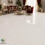 سرامیک هائولیت خاک سفید پاسارگاد سرام آباده معرفی محصول سرامیک هائولیت خاک سفید پاسارگاد سرام آباده یکی از محصولات پرطرفدار در بازار کاشی و سرامیک ایران است که با طراحی الهام‌گرفته از سنگ مرمر طبیعی، توانسته جایگاه ویژه‌ای در میان طراحان داخلی و مصرف‌کنندگان پیدا کند. همان‌طور که در تصویر محصول مشاهده می‌شود، زمینه سفید یکدست همراه با رگه‌های ظریف خاکستری و طلایی، ظاهری لوکس و چشم‌نواز به این سرامیک بخشیده است. این طراحی باعث می‌شود محصول علاوه بر کاربرد ساختمانی، نقش مهمی در زیبایی دکوراسیون داخلی ایفا کند. ابعاد 60×60 سانتی‌متری این محصول یکی از سایزهای استاندارد و پرکاربرد در صنعت ساختمان محسوب می‌شود. این ابعاد برای استفاده در فضاهای مسکونی، اداری و تجاری بسیار مناسب است و نصب آن نیز نسبت به اسلب‌های بزرگ آسان‌تر انجام می‌شود. به همین دلیل بسیاری از سازندگان و مجریان پروژه‌های ساختمانی این سایز را انتخاب می‌کنند. یکی از نکات مهم درباره این محصول، تنوع در نوع بدنه آن است. سرامیک هائولیت خاک سفید پاسارگاد سرام آباده علاوه بر بدنه خاک سفید، با جنس بدنه خاک قرمز نیز تولید و عرضه می‌شود. این موضوع به خریداران اجازه می‌دهد با توجه به نوع پروژه، بودجه و محل استفاده، گزینه مناسب را انتخاب کنند. بدنه خاک سفید معمولاً از کیفیت بالاتر و جذب آب پایین‌تری برخوردار است، در حالی که نمونه‌های خاک قرمز نیز به دلیل قیمت اقتصادی‌تر، در بسیاری از پروژه‌ها مورد استفاده قرار می‌گیرند.