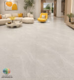 سرامیک مارتینا مات کاشی آسیا؛ انتخابی مدرن برای کف و دیوار ساختمان انتخاب سرامیک مناسب یکی از مهمترین تصمیمها در طراحی داخلی ساختمان است؛ زیرا علاوه بر زیبایی، بر دوام، نظافت و ارزش نهایی فضا نیز تأثیر مستقیم دارد. سرامیک مارتینا مات کاشی آسیا با ابعاد استاندارد 60×60 سانتیمتر، طراحی ساده و رنگی خنثی، یکی از محصولاتی است که توانسته نیاز بسیاری از معماران، طراحان داخلی و صاحبان خانه را برآورده کند. این محصول با الهام از بافت سنگهای طبیعی طراحی شده و بدون شلوغی در نقش و نگار، جلوهای آرام، مدرن و مینیمال ایجاد میکند. استفاده از طیف رنگی طوسی روشن و رگههای ملایم باعث میشود این سرامیک با بسیاری از رنگهای دکوراسیون داخلی هماهنگ باشد و فضای منزل یا محیط کار را بزرگتر و روشنتر نشان دهد. یکی از مهمترین مزایای سرامیک مارتینا مات کاشی آسیا، انعطافپذیری بالای آن در طراحی فضاهای مختلف است. چه قصد بازسازی منزل را داشته باشید و چه در حال ساخت یک پروژه جدید باشید، این سرامیک میتواند انتخابی مطمئن برای کف و حتی برخی دیوارهای داخلی باشد. سطح مات این محصول علاوه بر ایجاد ظاهری لوکس و امروزی، بازتاب نور را کاهش میدهد و در نتیجه محیطی آرامتر و طبیعیتر ایجاد میکند. همچنین آثار لکه، گردوغبار و رد پا نسبت به بسیاری از سرامیکهای براق کمتر روی آن دیده میشود؛ موضوعی که برای خانوادههای پرجمعیت یا محیطهای پرتردد اهمیت زیادی دارد.