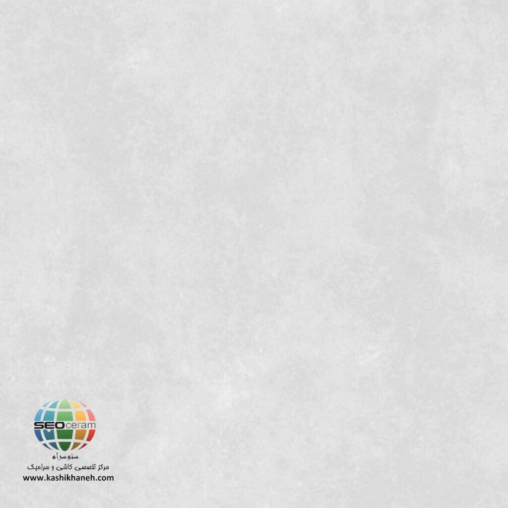 سرامیک پرسلان سندی طوسی روشن مات کاشی آسیا 120×120 اگر به دنبال یک سرامیک مدرن، بادوام و هماهنگ با سبک‌های جدید معماری هستید، سرامیک پرسلان سندی طوسی روشن مات کاشی آسیا 120×120 یکی از بهترین انتخاب‌هایی است که می‌تواند زیبایی و کیفیت را هم‌زمان در اختیار شما قرار دهد. این محصول با بهره‌گیری از فناوری تولید پرسلان، طراحی مینیمال و رنگی خنثی، پاسخگوی نیاز پروژه‌های ساختمانی مختلف از واحدهای مسکونی گرفته تا ساختمان‌های اداری و تجاری است. در تصویر سرامیک پرسلان سندی طوسی روشن مات کاشی آسیا 120×120 ، زمینه‌ای با رنگ طوسی روشن و بافتی الهام‌گرفته از شن و ماسه یا سندی دیده می‌شود که جلوه‌ای طبیعی، آرام و بسیار شیک به فضا می‌بخشد. همین ویژگی باعث شده است که این سرامیک در میان طراحان داخلی و معماران محبوبیت بالایی داشته باشد.